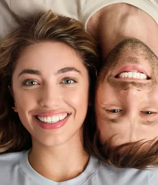 Man and woman smiling