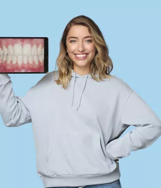 Spark Aligners woman holding tablet