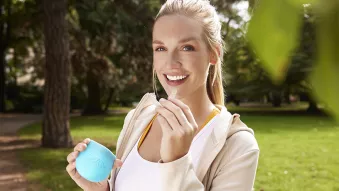 Close up of smiling woman, white teeth, highlighting the effective and discreet results of using Spark clear aligners