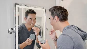 Man with Spark Aligners mirrors