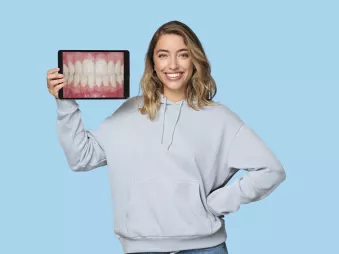 Spark Aligners woman holding tablet