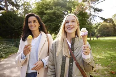 Two women are eating ice cream