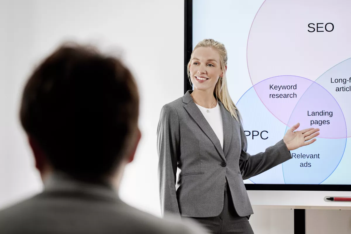 Woman wearing Spark Aligners giving a presentation